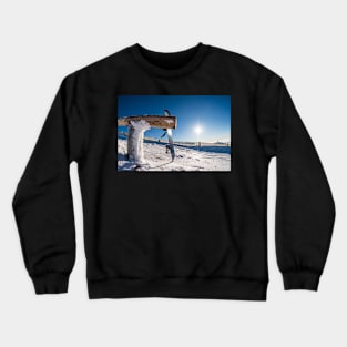 Snowboard leaning on a wood rail Crewneck Sweatshirt